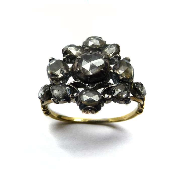 Antique rose diamond fancy cluster ring, as a vase of flowers with silver scrollwork